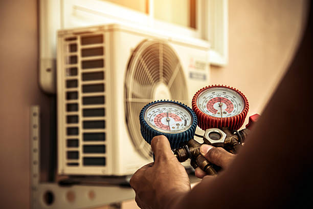 Professional Ac Installation technician working in Riegelsville, PA